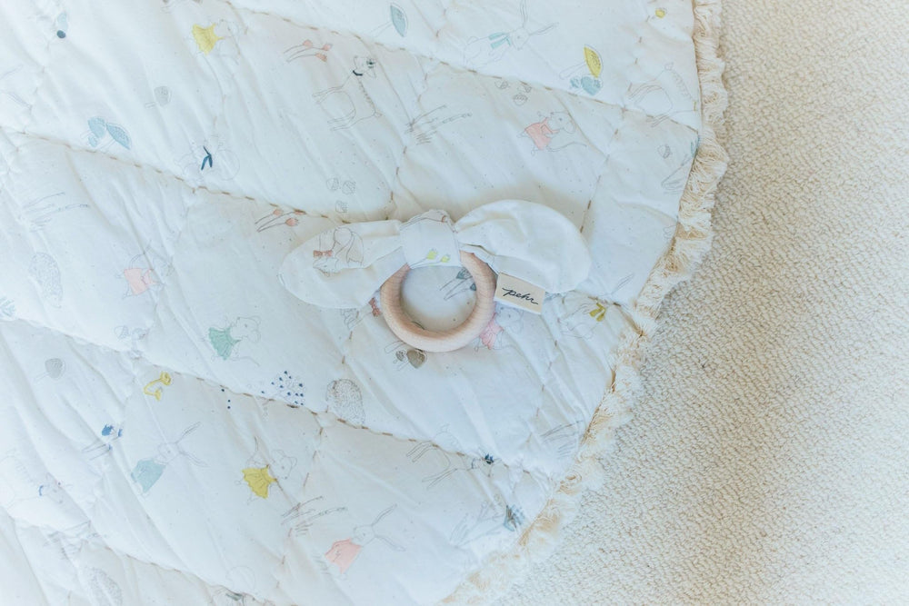 PEHR Magical Forest Play Mat tummy time scene engaging baby's gaze.