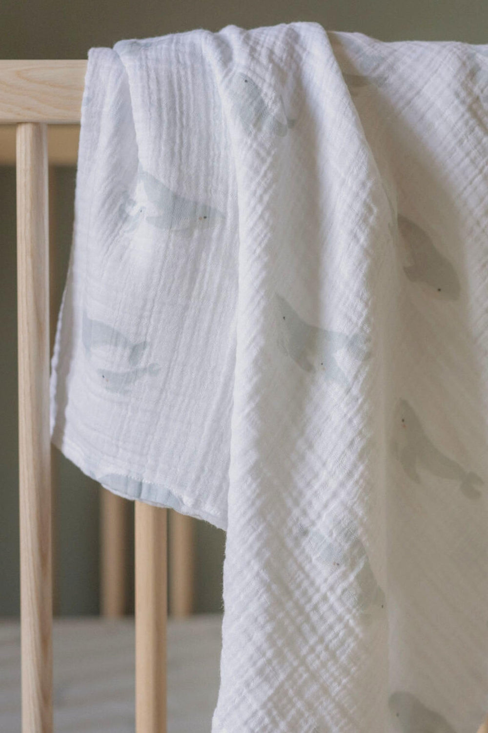 PEHR organic muslin swaddle spread to show generous 47x47 size.