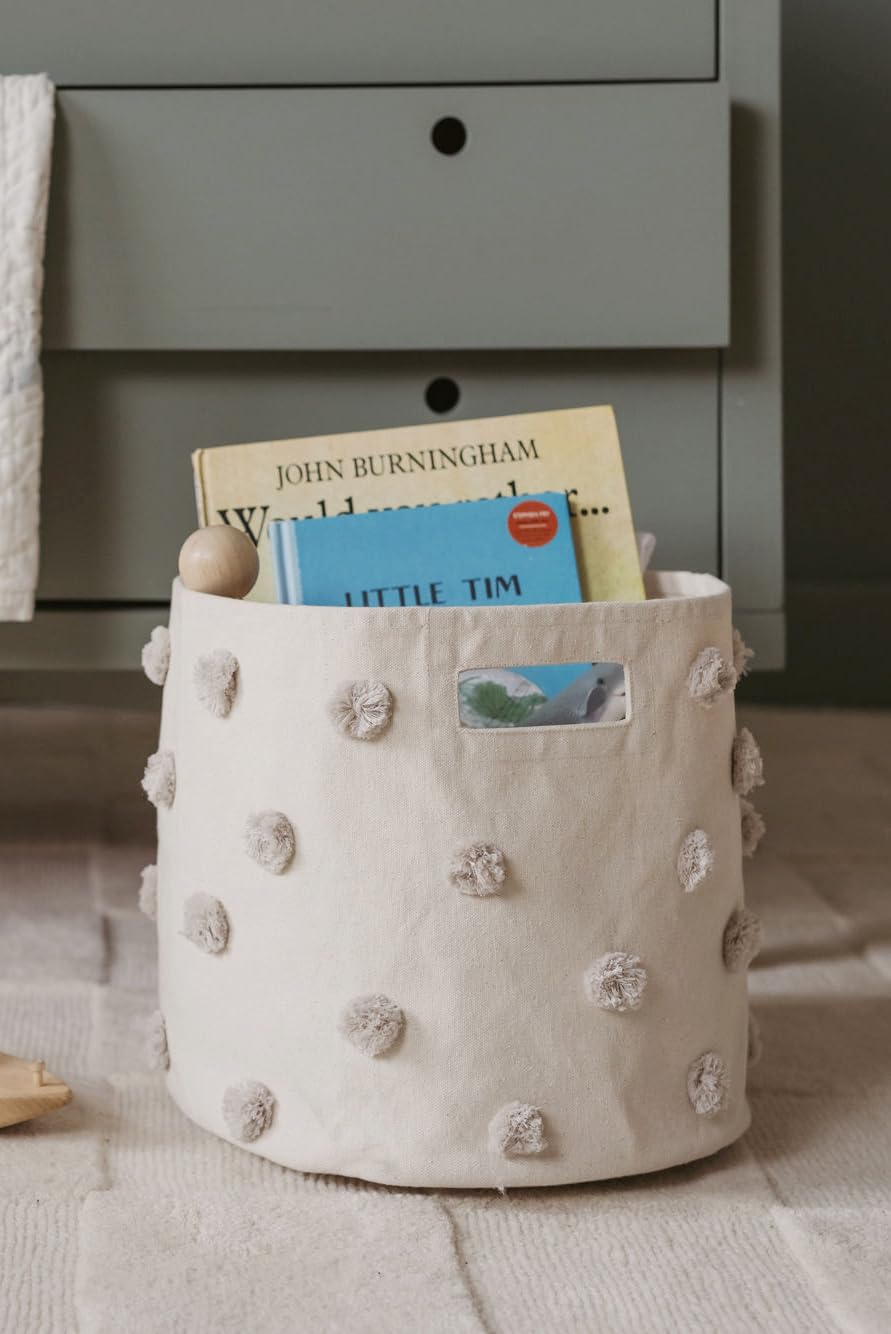 Pehr Pom Pom Basket Grey with toys showcases catch-all option