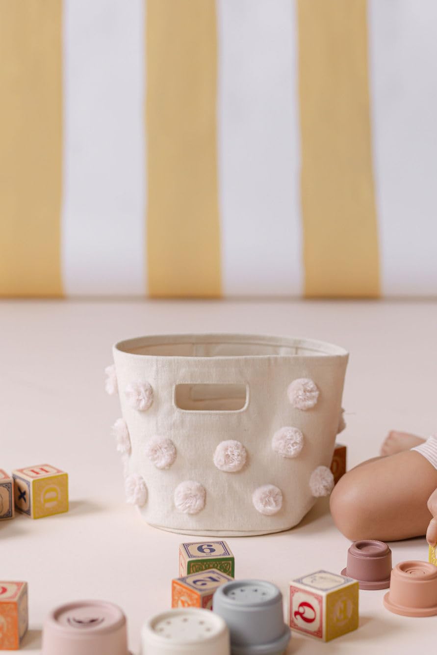 Pehr Pom Pom Basket Mini Blush material closeup shows sturdy canvas.