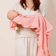PEIPEIWU Organic Muslin Baby Blanket in crib scene - versatile swaddle and stroller use.