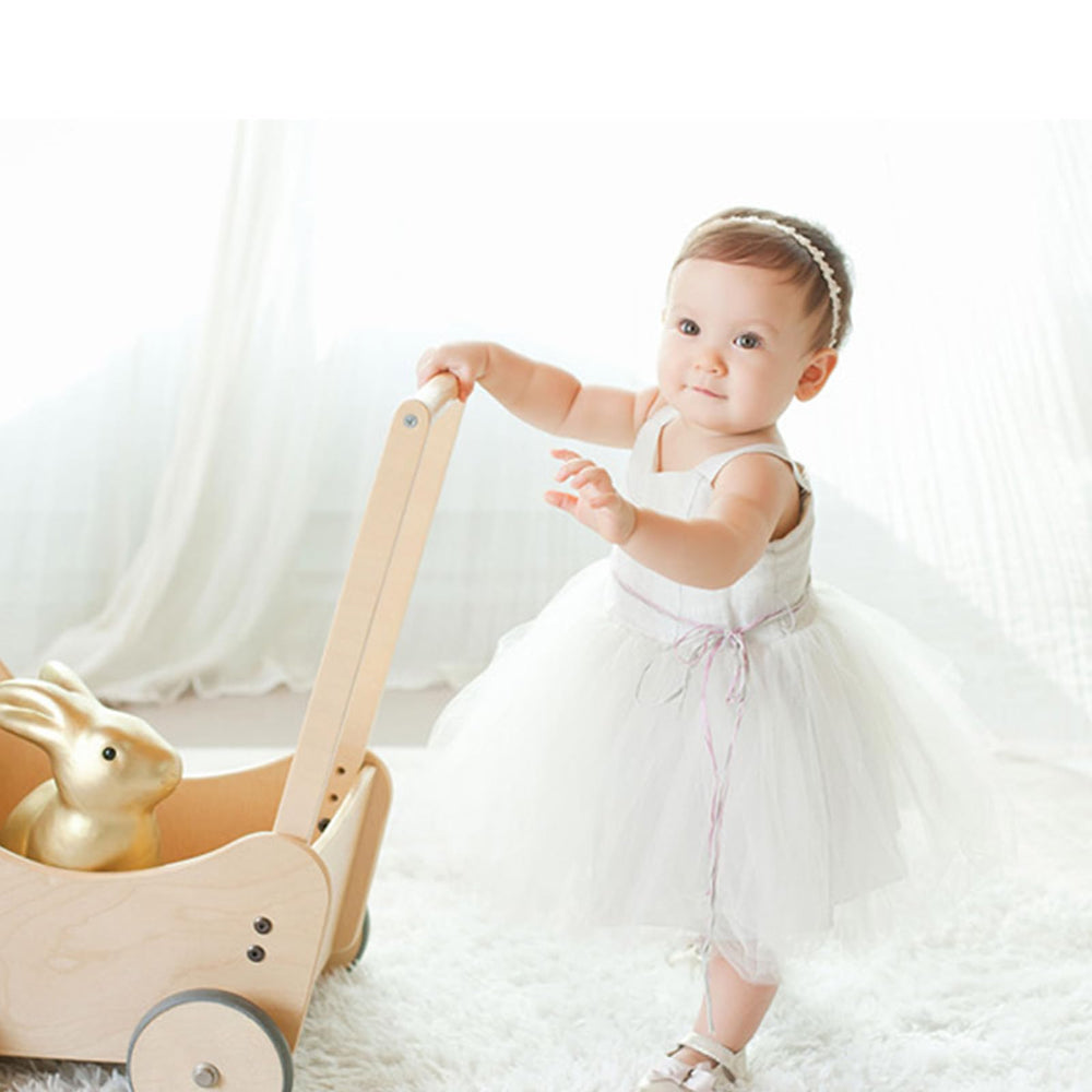 Pejlnd headband newborn photoshoot-friendly accessory complements outfits.
