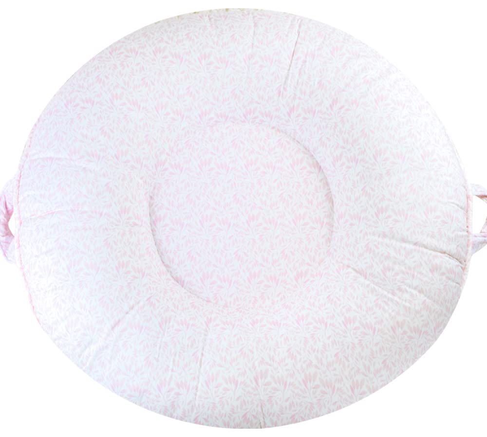 Pello multi-use floor pillow showing plush comfort for tummy time and lounging.