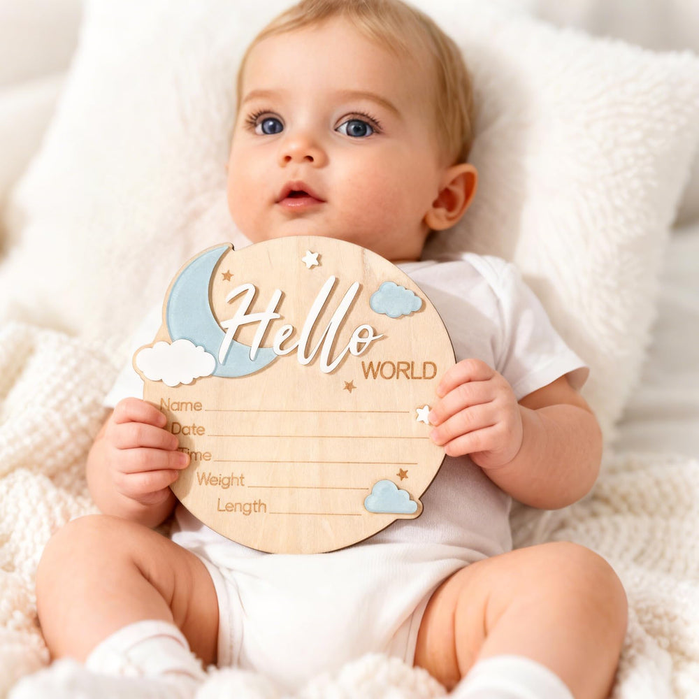 Penitue baby announcement sign closeup-surface highlights smooth writing area.