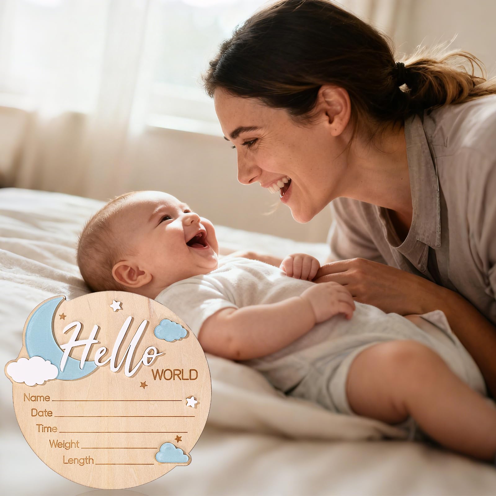 Penitue baby announcement sign 15cm disk sized for shelf or wall display.
