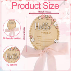 Penitue baby announcement sign with stand and pink ribbon for photo-ready display.