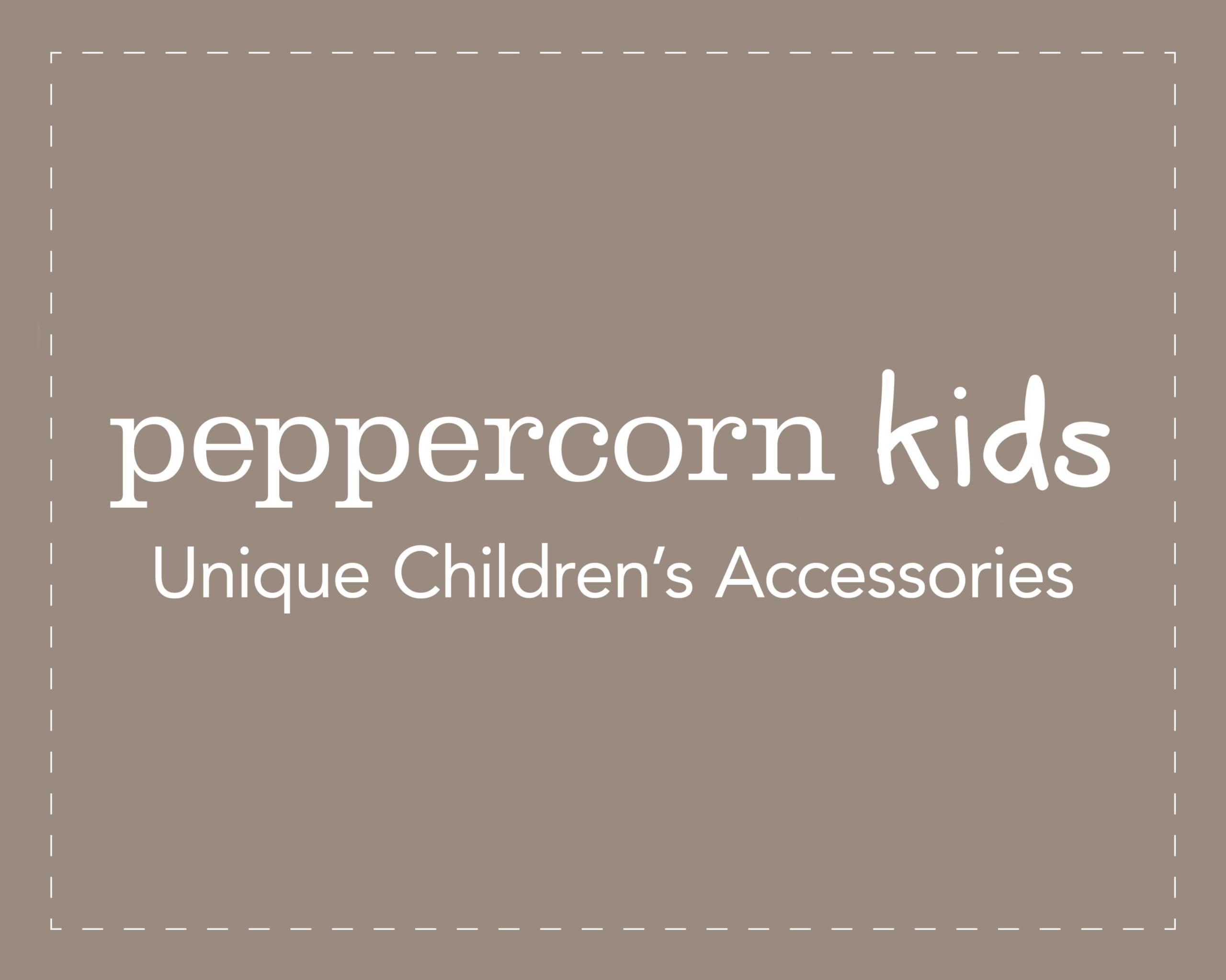 Peppercorn Kids outdoor-ready pink headband great for beach trips.
