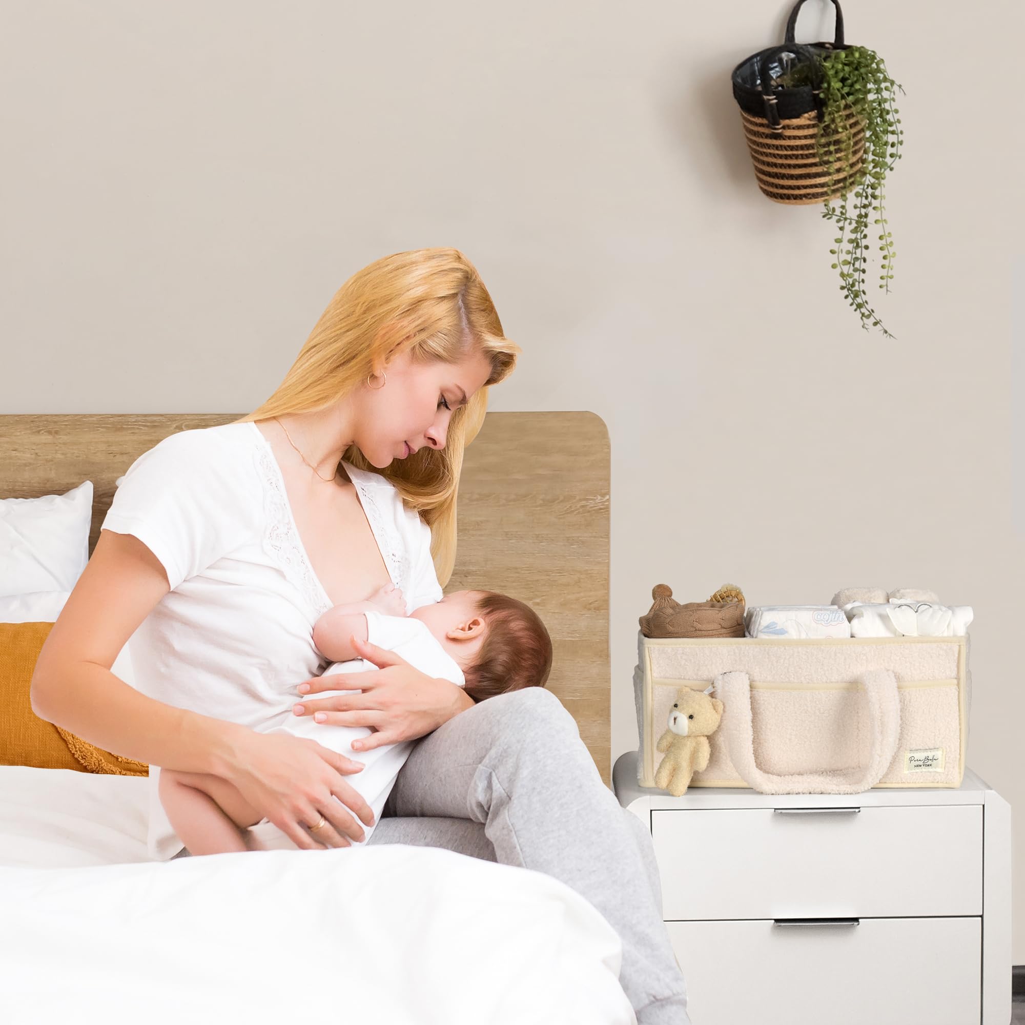 Perabella bear charm diaper caddy adds gift-ready charm for new moms.
