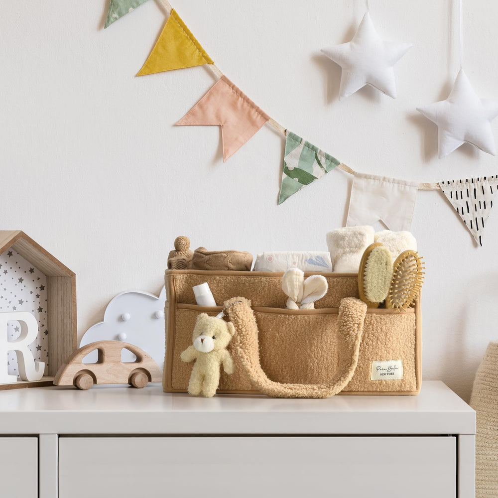 PeraBella Diaper Caddy stores wipes, creams, and toys neatly.