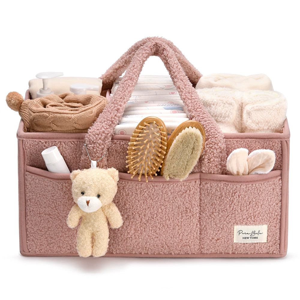 PeraBella diaper caddy with handle keeps baby essentials organized for travel.