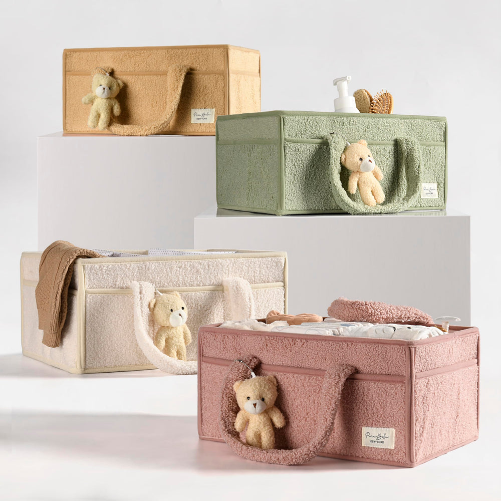 Perabella diaper tote storage bin keeps wipes and creams within reach.