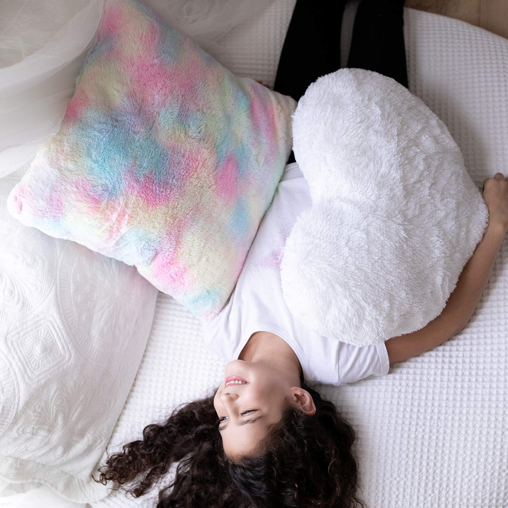 Perfectto Design rainbow plush pillow brings colorful texture to a kid's room.
