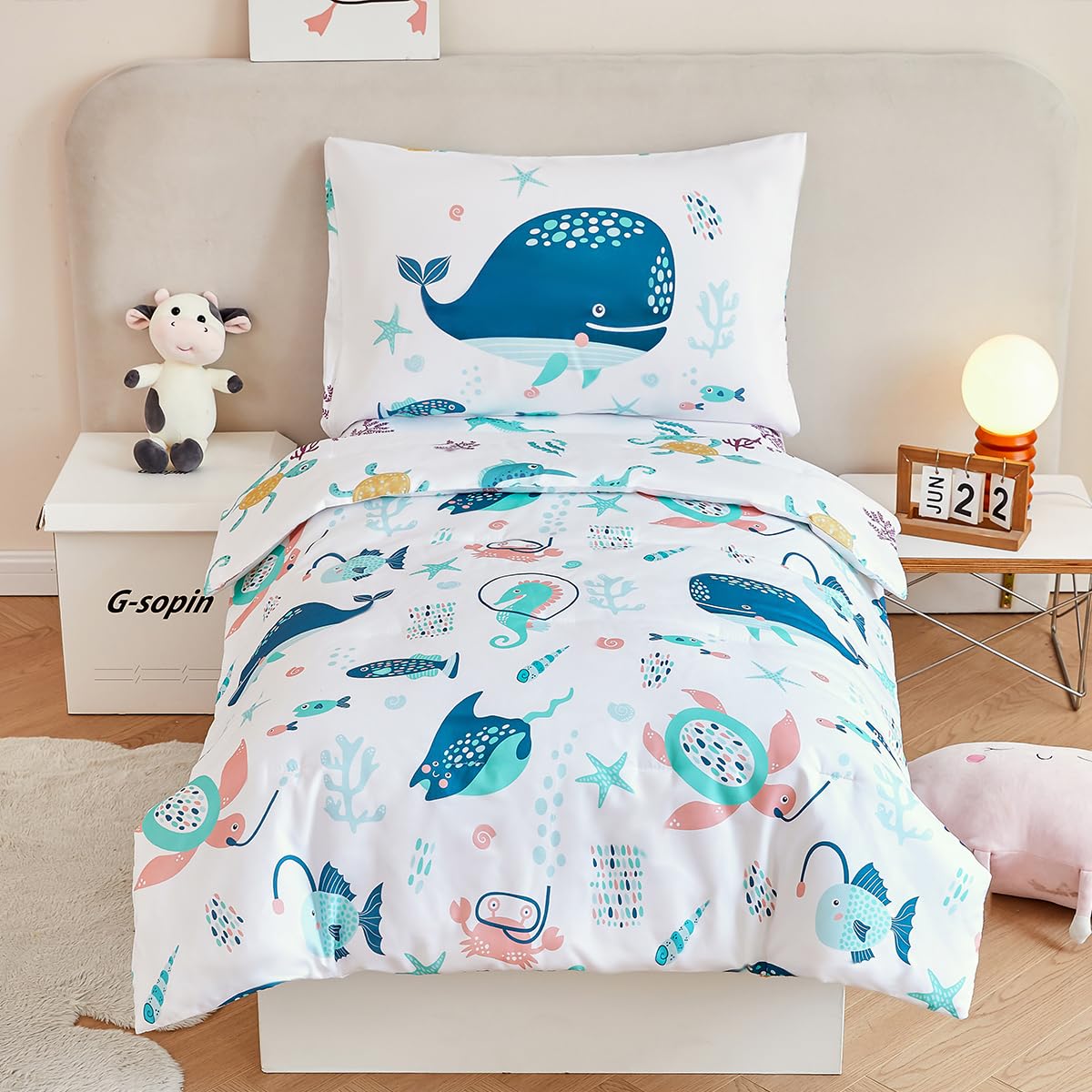 PERFEMET ocean-toddler-bedding-comforter shows whale pattern for cozy bedtime atmosphere