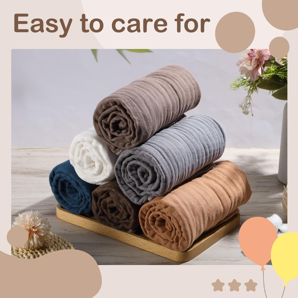 Peryiter muslin hooded towel swaddling image shows versatile blanket and nursing cover use
