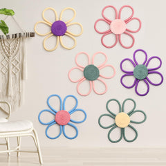 Peryiter nursery wall decor closeup shows sticky tack mounting for effortless setup