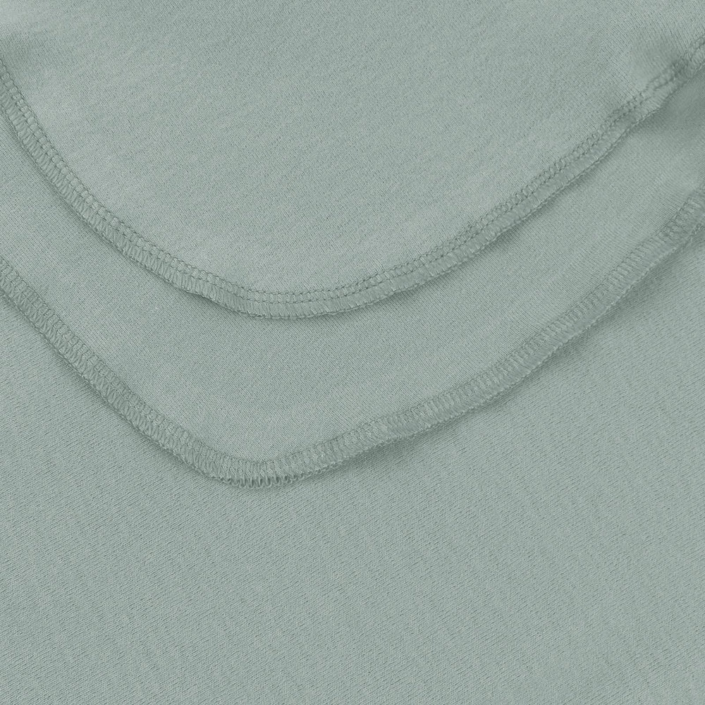 Pesaat swaddle blanket close-up showing soft, breathable fabric for cozy wraps.