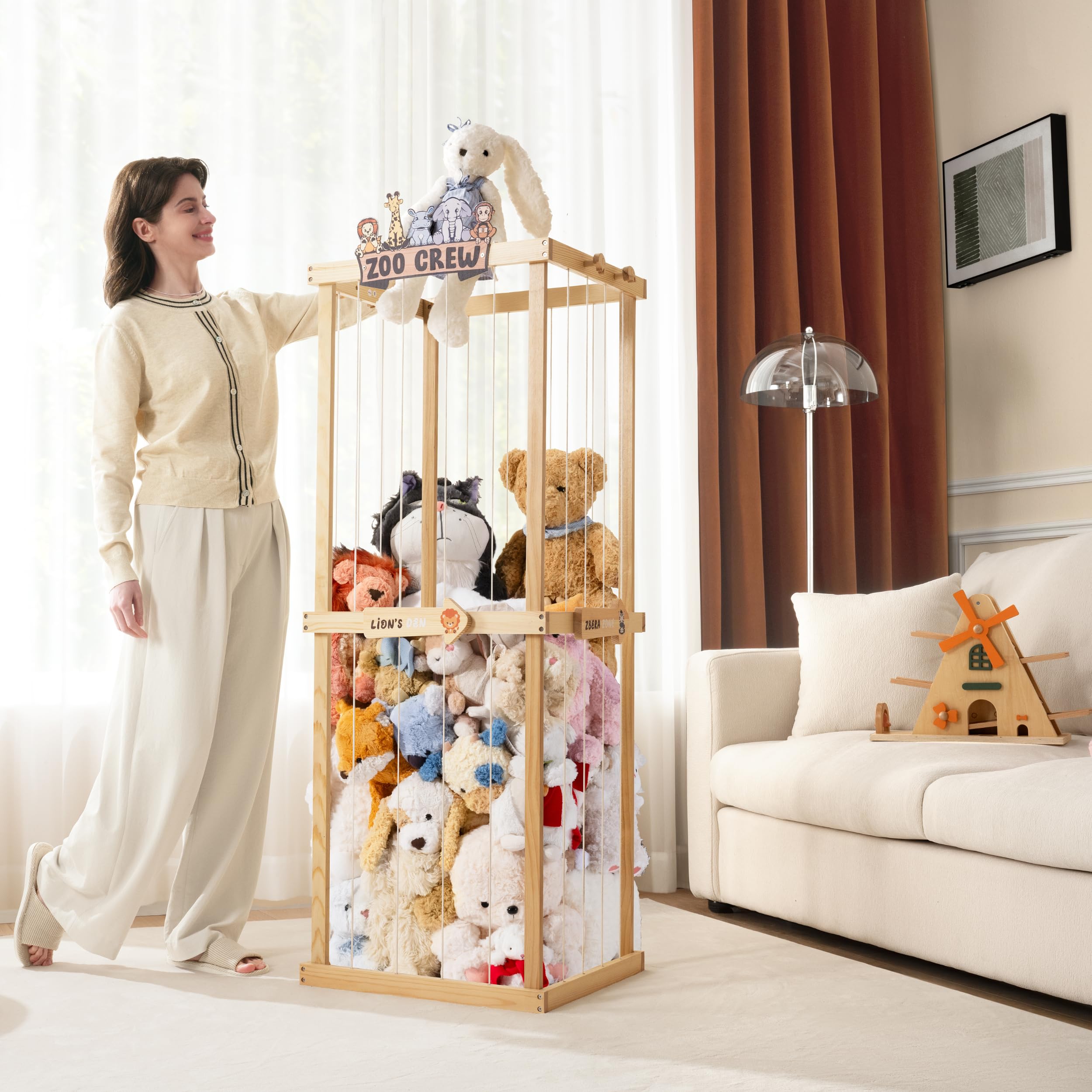 Pete&Eile wooden storage with elephant hooks white front-angle demonstrates hanging bags and plushies