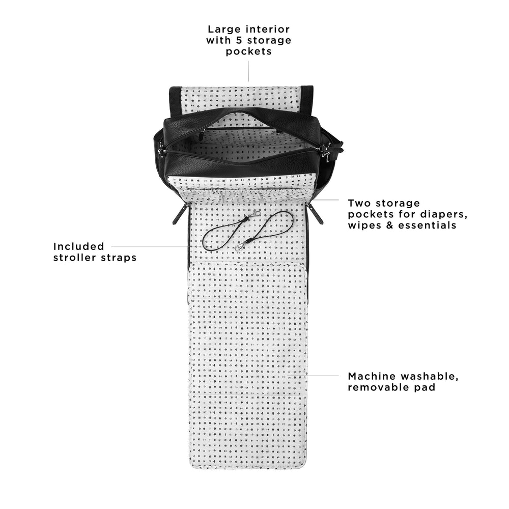 Petunia Pickle Bottom Boxy Backpack change station in action with removable pad