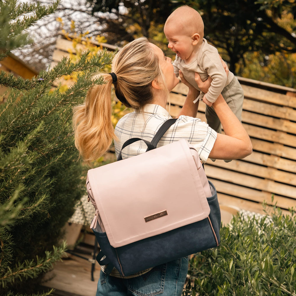 Petunia Pickle Bottom Boxy Backpack cross-body option for versatile carry.