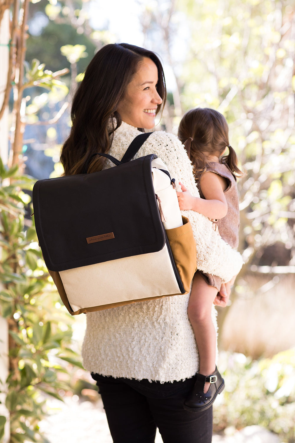 Petunia Pickle Bottom Boxy Backpack fabric close-up shows water-resistant material and durability.