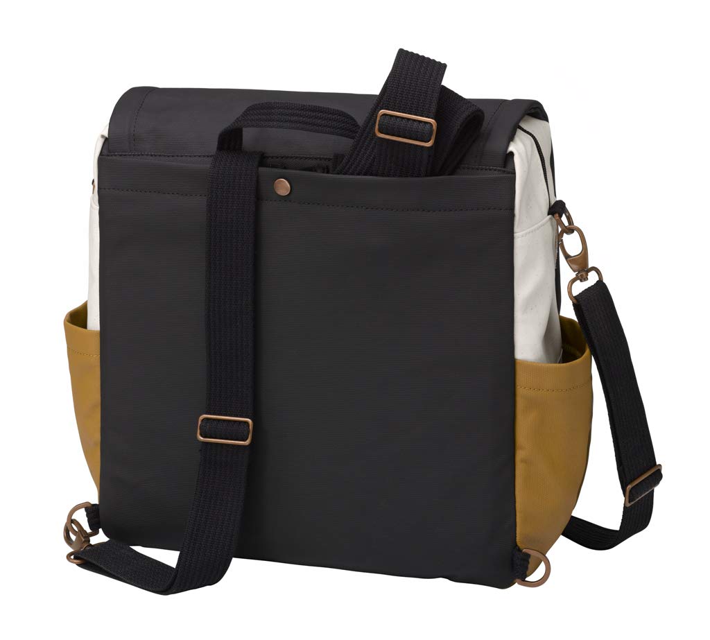 Petunia Pickle Bottom Boxy Backpack open changing station demonstrates easy diaper changes on the go.