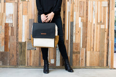 Petunia Pickle Bottom Boxy Backpack side pocket for bottles and quick access.