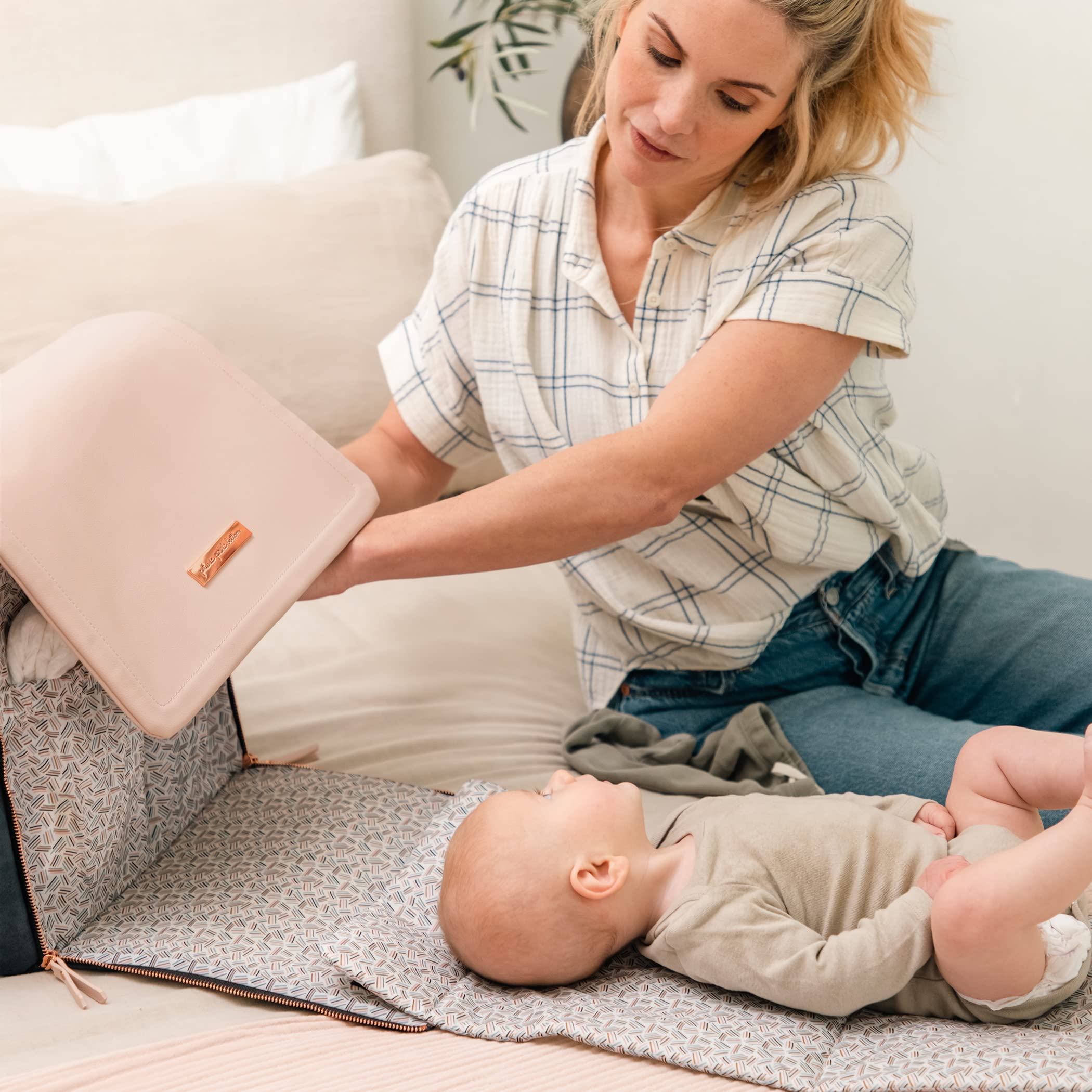 Petunia Pickle Bottom Boxy Backpack water-resistant lining protects everyday spills.