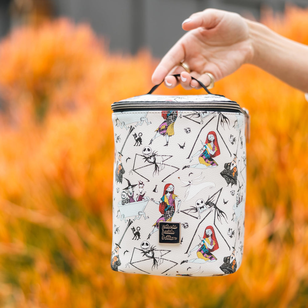 Petunia Pickle Bottom Cool Pixel Plus Disney Halloween Town pattern adds festive style.