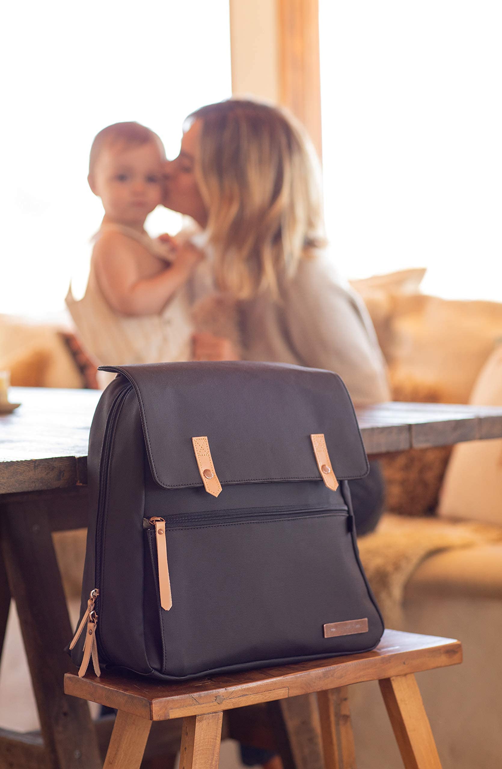 Petunia Pickle Bottom Meta Backpack stroller clip for hands-free errands