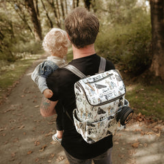Petunia Pickle Bottom Method Backpack exterior pockets offer quick-access bottles and items.