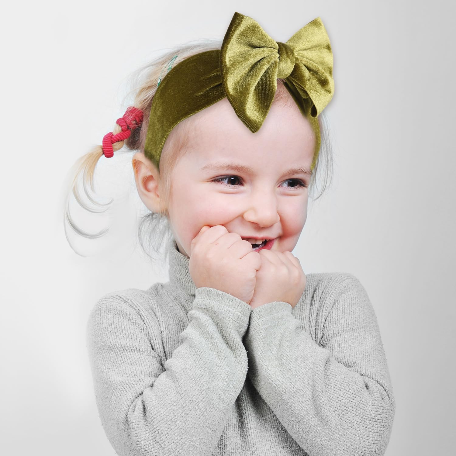 PEUTIER velvet baby bow red headband adds cute pop to party ensembles.