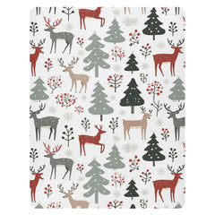 Pfrewn Christmas crib sheet pattern closeup highlighting festive trees and reindeer for nursery charm.