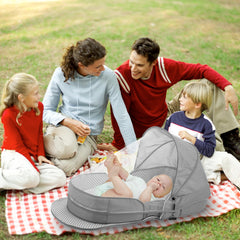 PGONEEE travel bassinet with mosquito-net canopy protecting baby