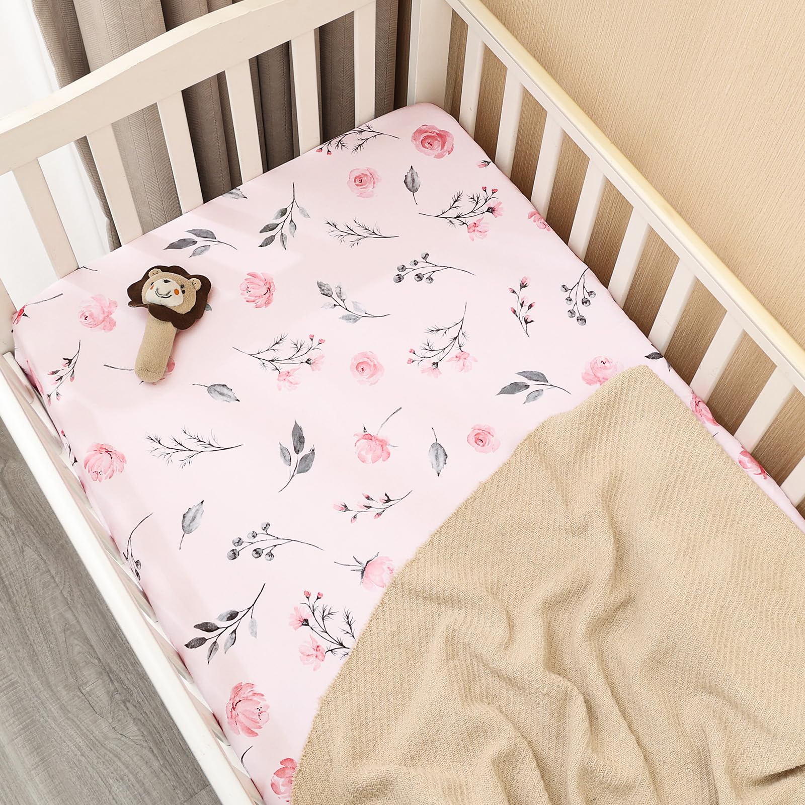 PHF baby sleep scene with cozy pink floral sheet