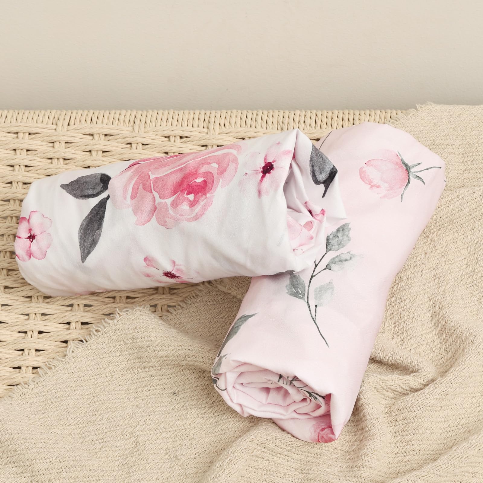 PHF two-pack pink floral sheets provide stylish nursery options.