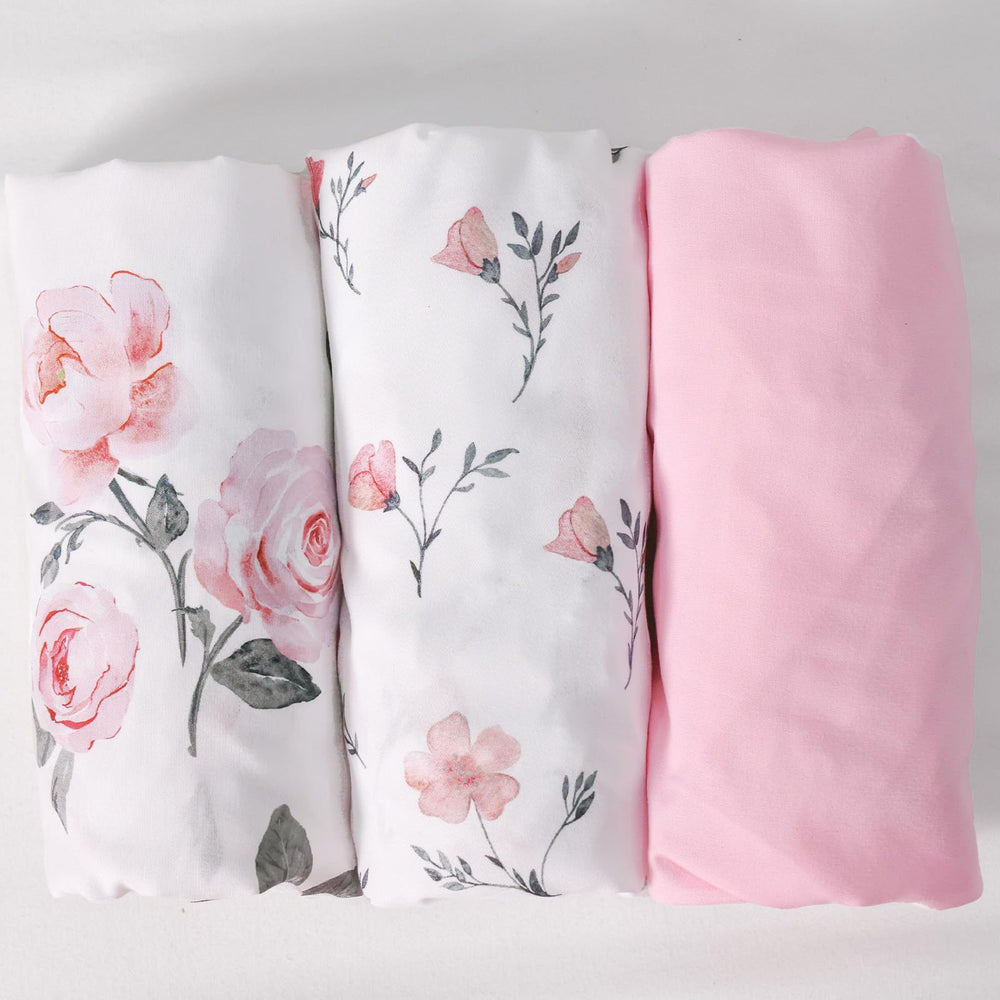 PHF rose floral sheets in use on a cradle showing secure fit.