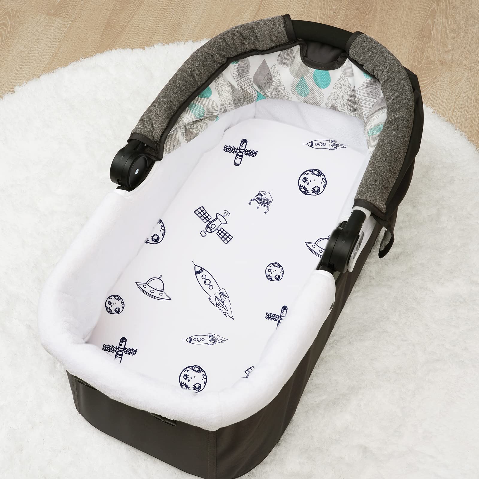PHF Soft Bassinet Sheet Planets Pattern with five inch pocket stays in place