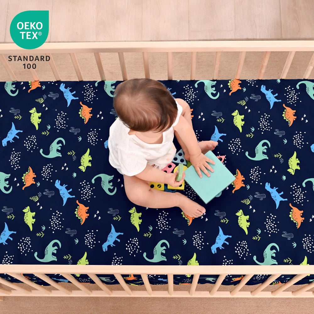 PHF dinosaur crib sheets close-up shows plush texture for baby comfort.