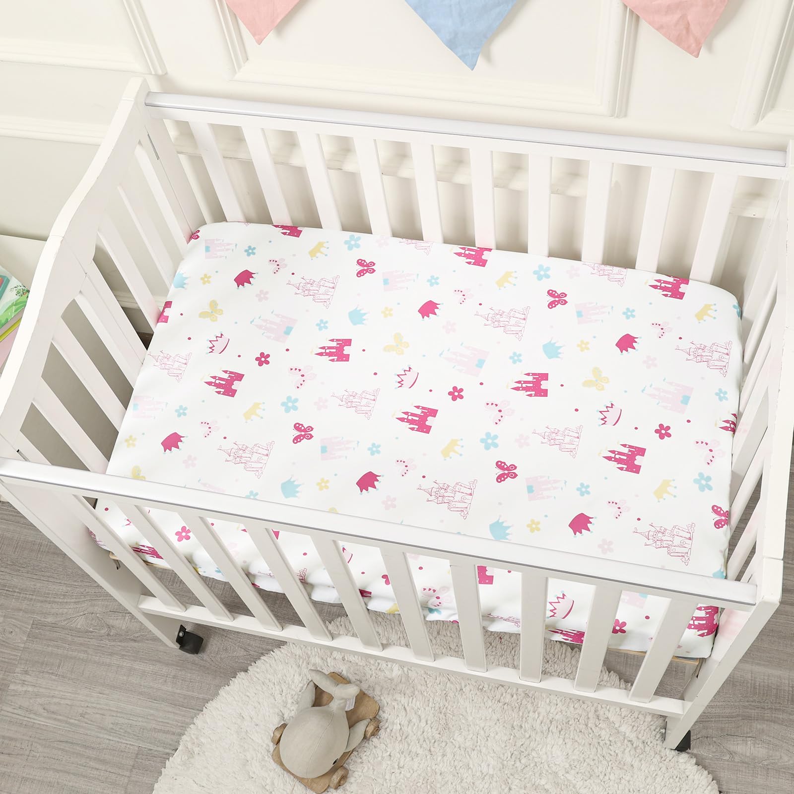 PHF sheets in use on a playard suggest easy cleanup and tidy bedding.