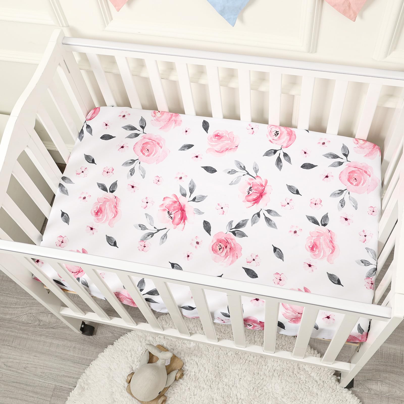 PHF Soft Mini Crib Sheet Set in use on a playyard for cozy nights.