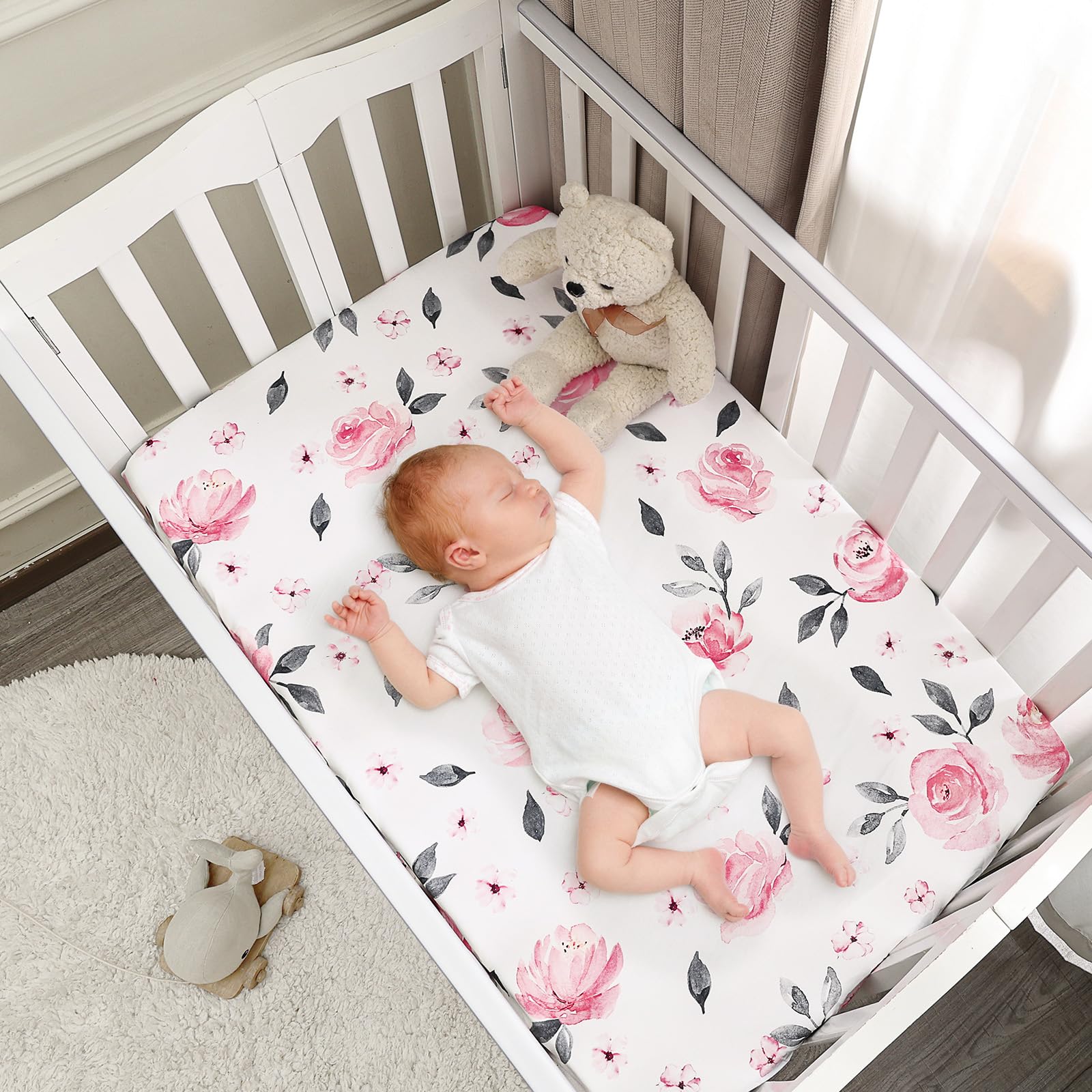 PHF Soft Mini Crib Sheet Set two-pack keeps extra sheets ready for quick changes.