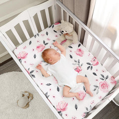 PHF Soft Mini Crib Sheet Set two-pack keeps extra sheets ready for quick changes.