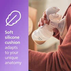 Philips Avent 4oz Natural bottle demonstrates spill-free milk storage after pumping.