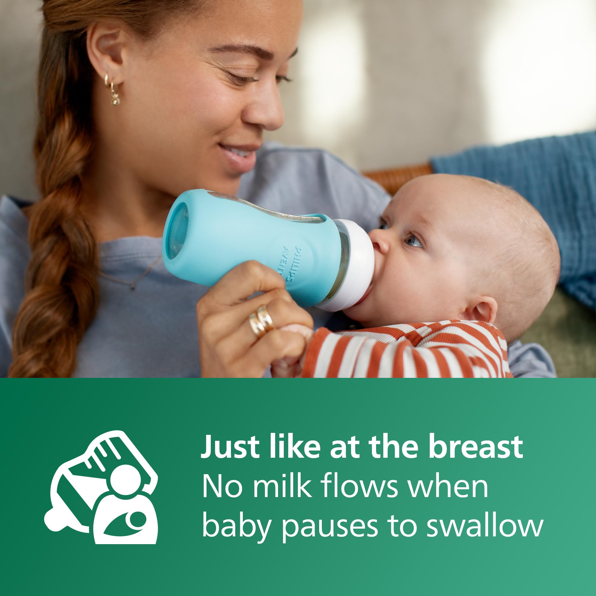 Philips Avent anti-colic valve on glass bottle guiding air away from tummy