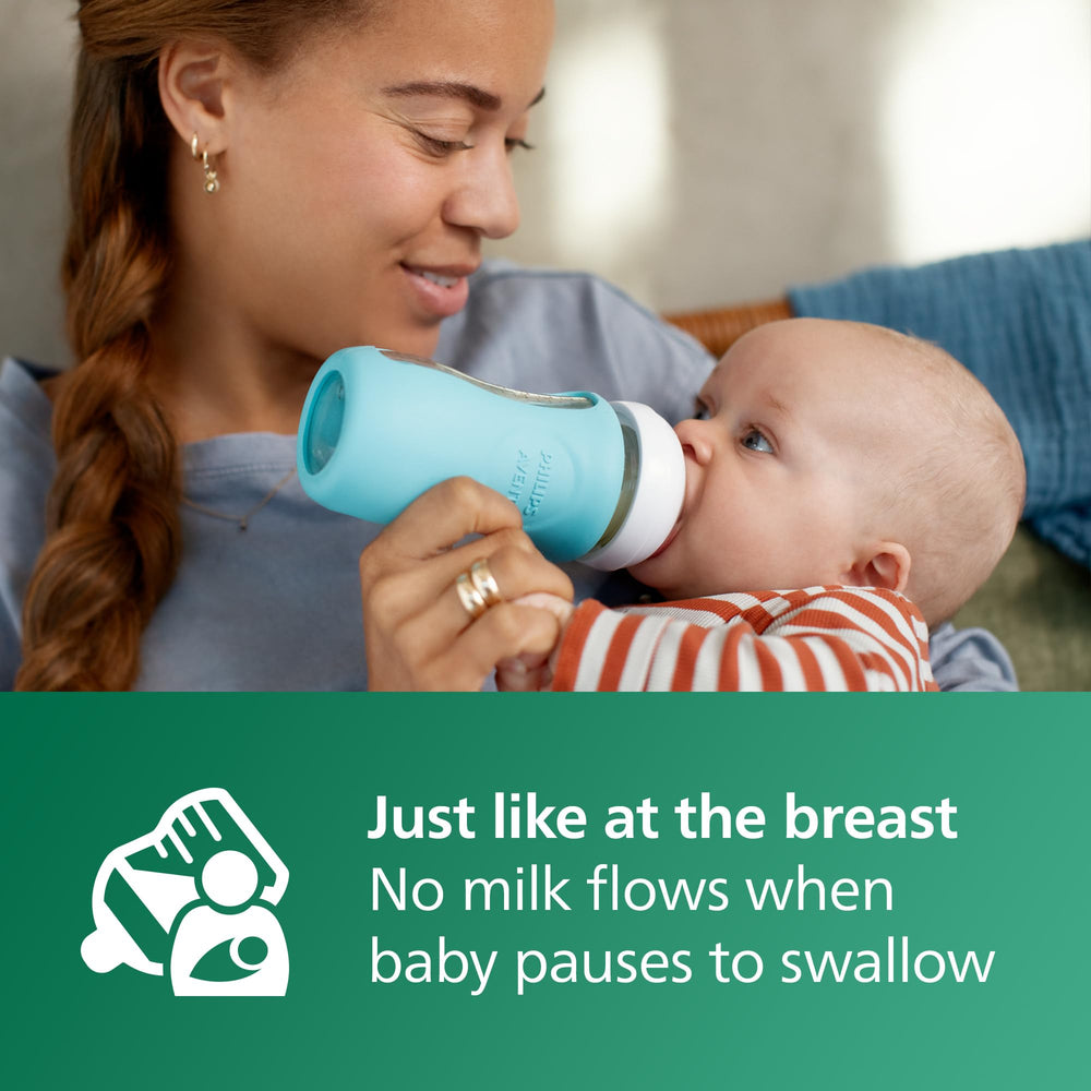 Philips Avent anti-colic valve on glass bottle guiding air away from tummy