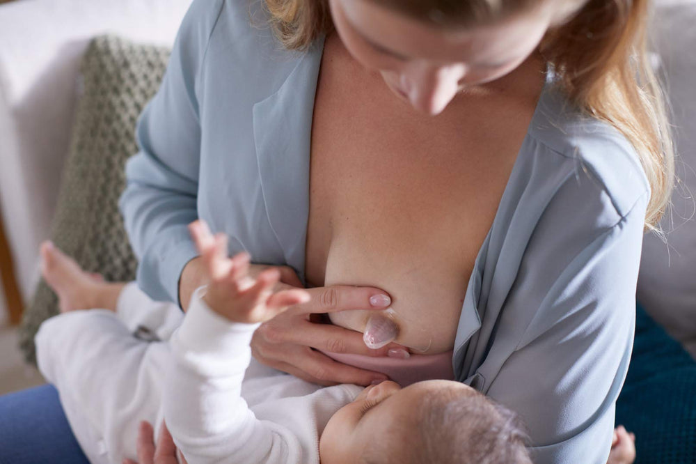 Philips Avent medium shield in use during nursing session for comfort.