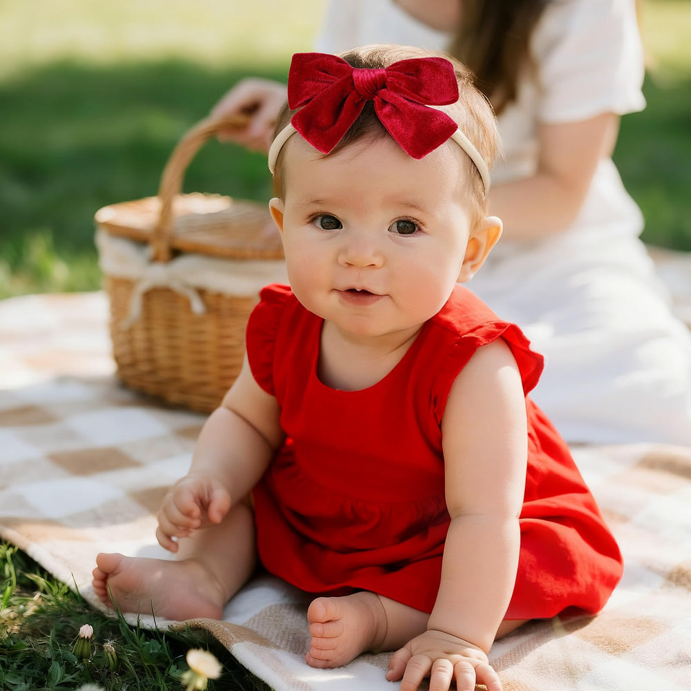 phnydreg velvet bow headband red side view pairs with festive outfits and family portraits.