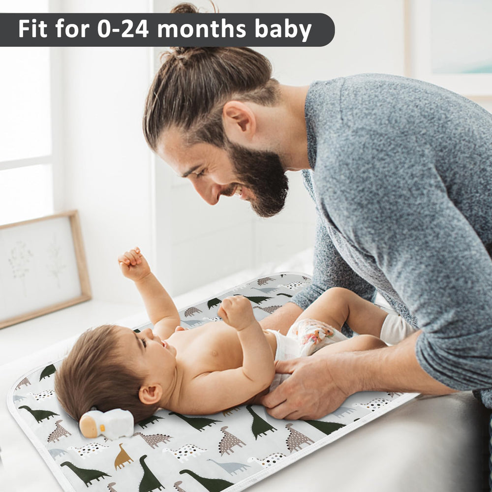 PHOEBUS BABY changing pad provides full coverage for contoured pads.