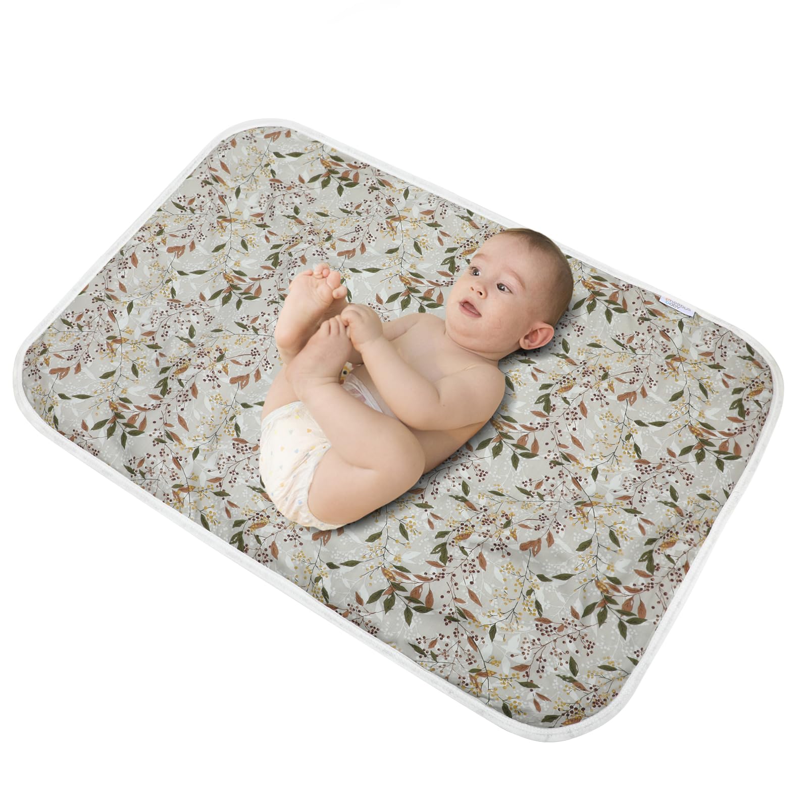PHOEBUS BABY changing pad with leaf pattern on top offers a soft cotton surface.