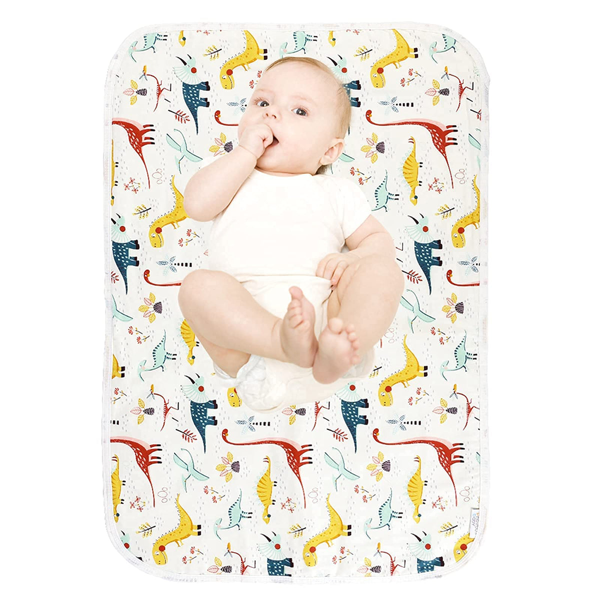 PHOEBUS BABY dinosaur changing pad top view shows soft cotton surface for gentle diaper changes.